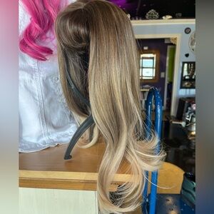 Blonde wig with bangs.